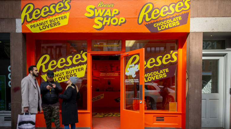 Orange and yellow storefront promoting Reese's chocolate