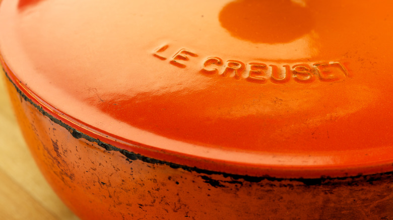 Closeup on damaged Le Creuset Dutch oven