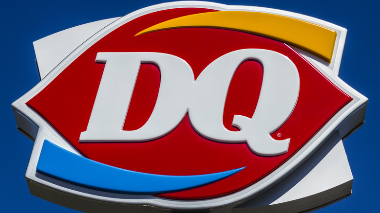 Red, white, yellow, and blue Dairy Queen logo