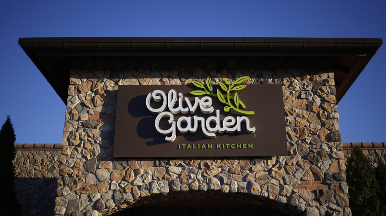 Olive Garden Italian Kitchen sign on stone building