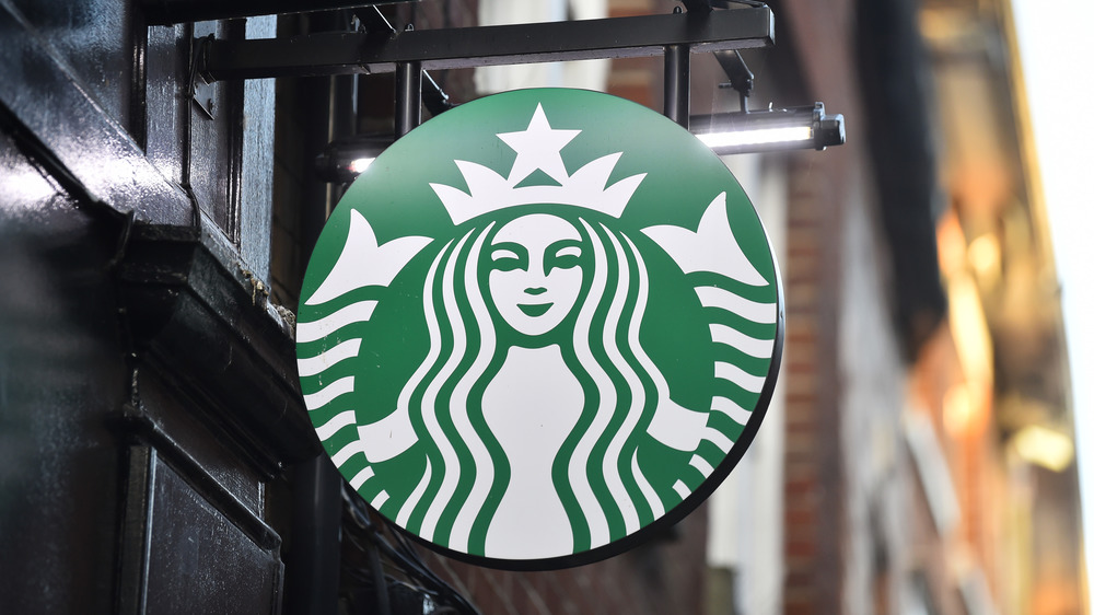 Starbucks logo on a hanging sign