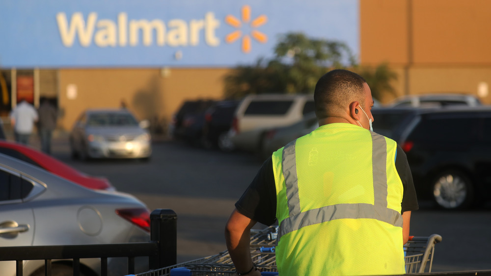 Walmart worker in parking lot