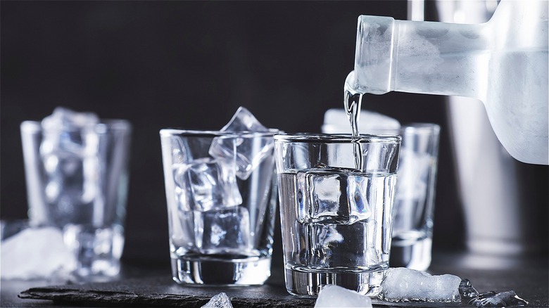 Icy vodka poured on ice