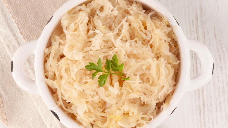 bowl of sauerkraut with garnish