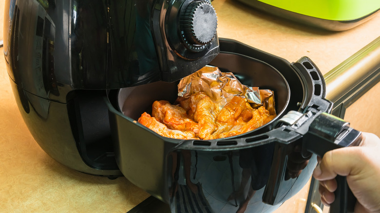 Air fryer with wings