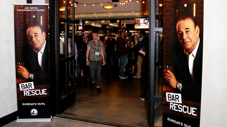 "Bar Rescue" banners outside bar