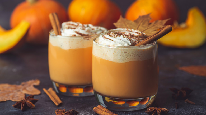 Pumpkin spice lattes in glass mugs