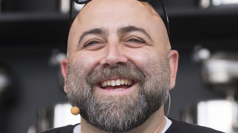 Duff Goldman smiling at event  