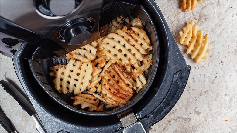 Air fryer with waffle fries - not exploded.