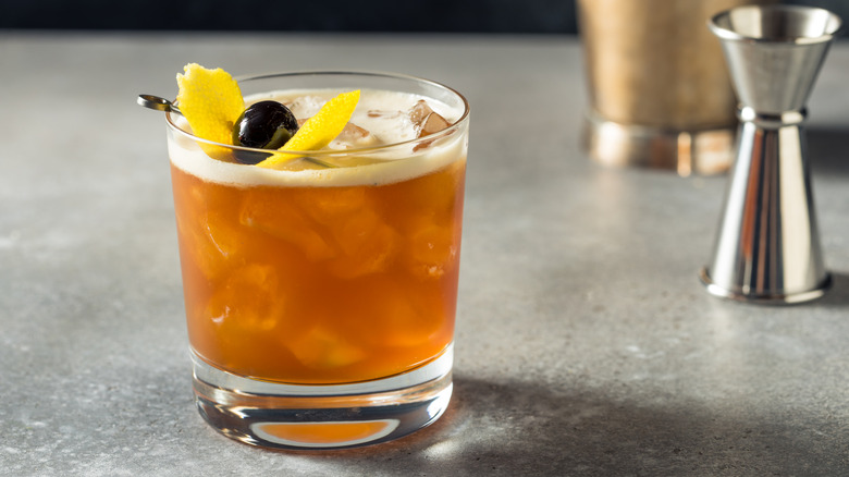 Whiskey sour cocktail with jigger