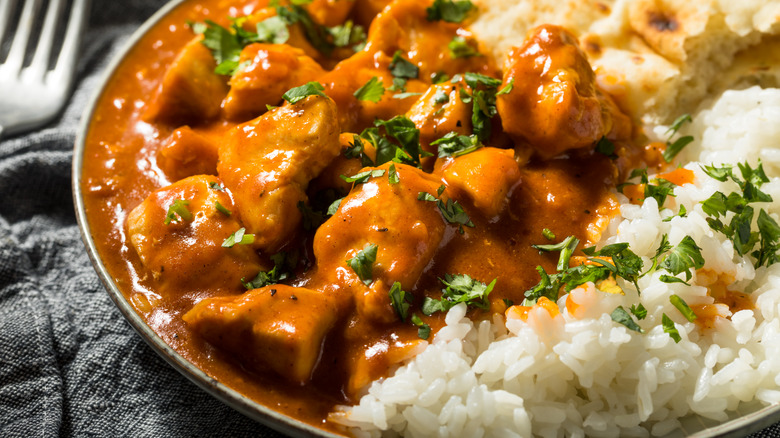 chicken curry on plate with rice