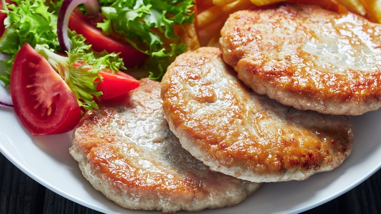 turkey burger patties on plate