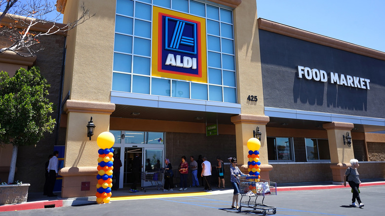 Shoppers outside Aldi store