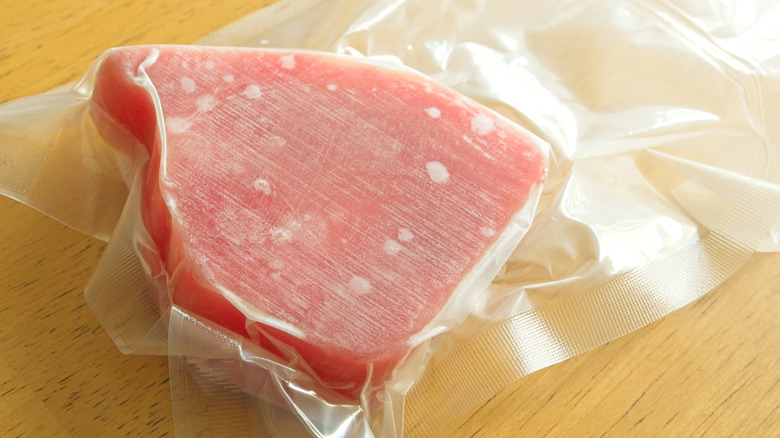 Frozen steak sealed in plastic
