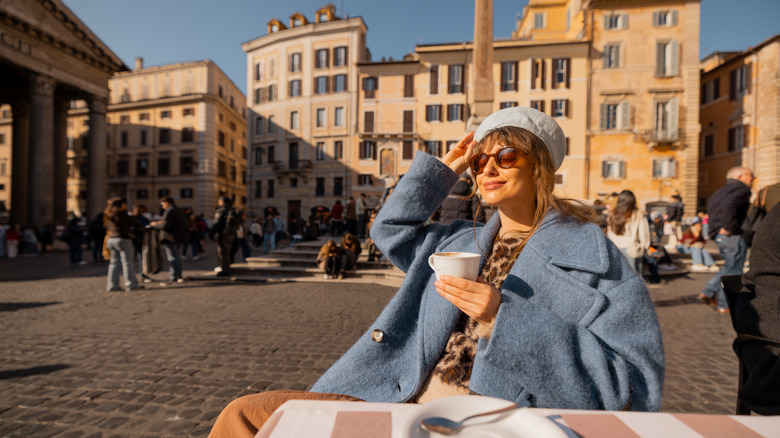 Morning coffee at a table in front of the Pantheon in Rome, soaking up the sun and vibrant street life.