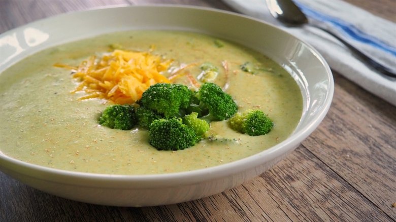 white bowl of broccoli cheddar soup