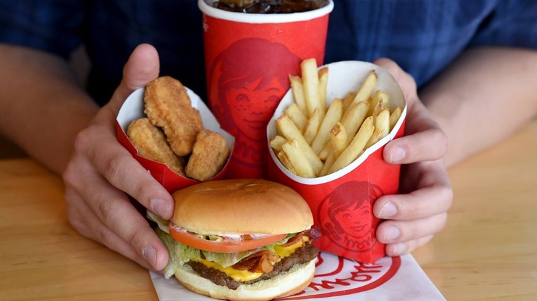 Chicken nuggets, fries, jr. bacon cheeseburger, and drink from Wendy's