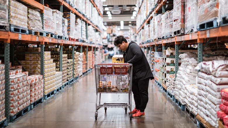 Costco store and shopper with cart