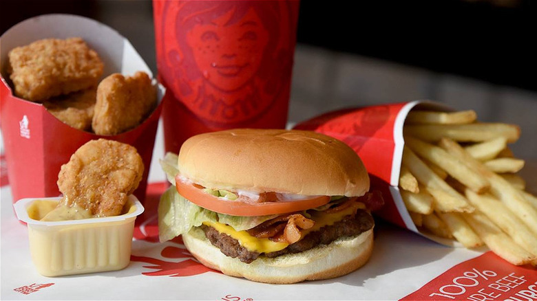 Wendy's burger, chicken nuggets, fries, and a drink