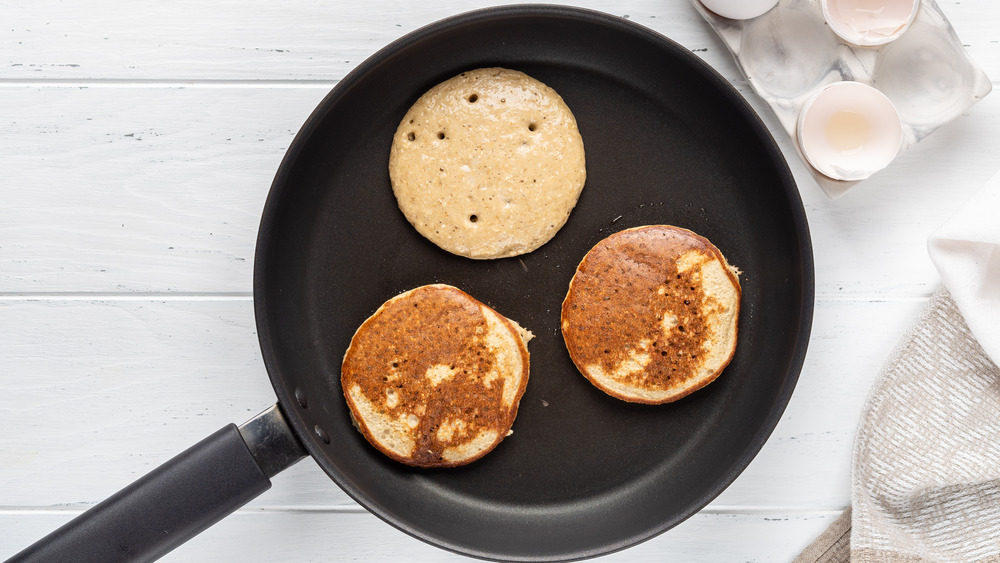 Pancakes cooking in a pan