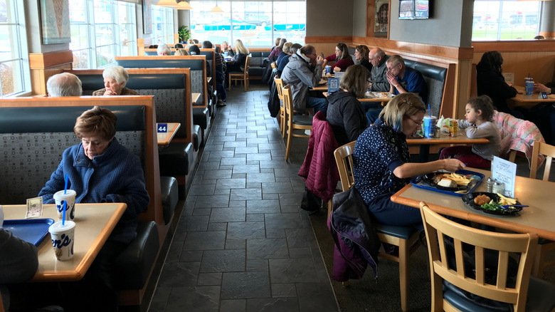 Diners eating inside Culver's restaurant