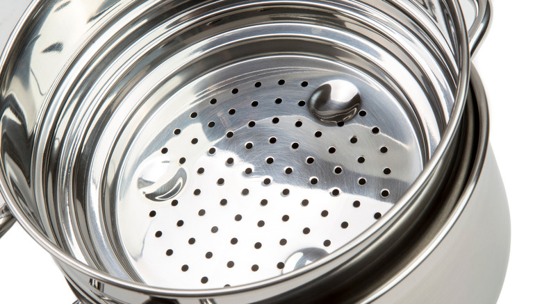 A close-up of a steamer basket for a stovetop pot