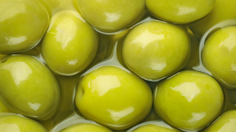 Whole green olives in oil