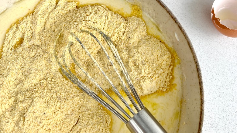 Mixing cornbread batter