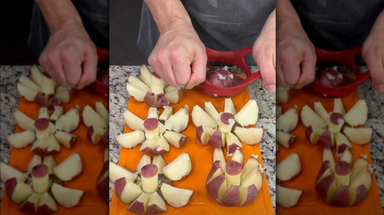 Kyle Istook cutting bloomin' potatoes with an apple slicer.