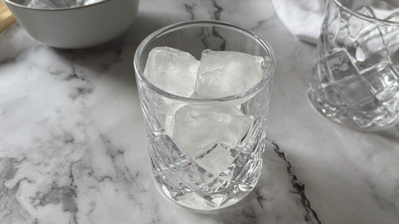 drinking glass filled with ice