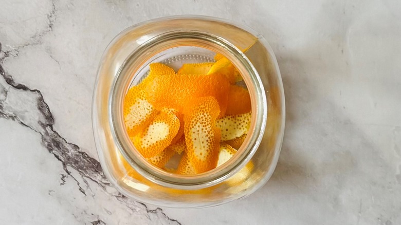 Orange peels in jar