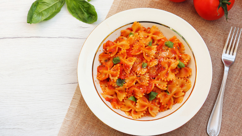 bowl of farfelle with red sauce