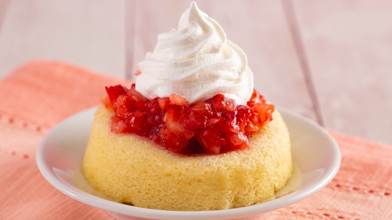 strawberry shortcake topped with whipped cream