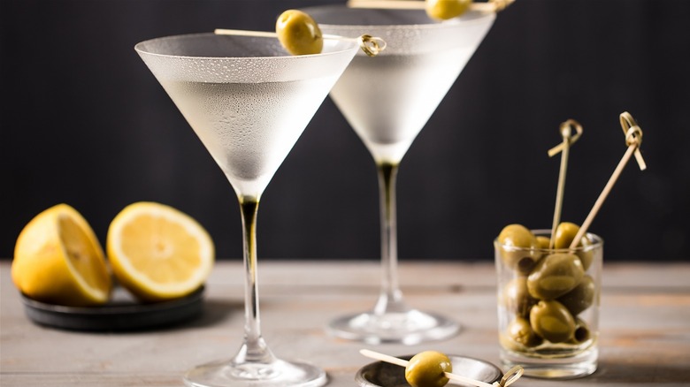 two dry martinis with olives