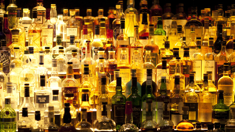 Selection of liquor bottles at bar