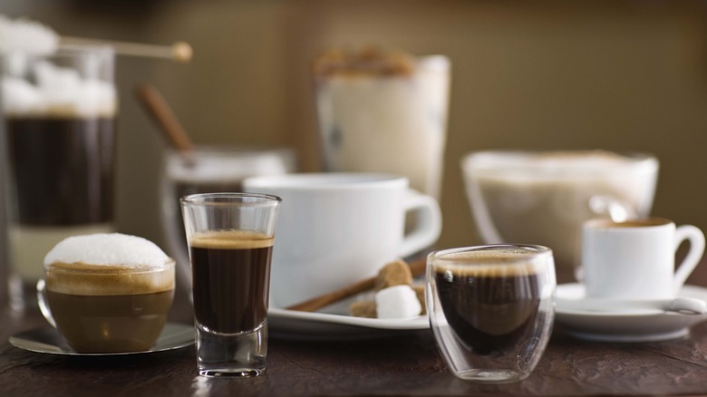 Various kinds of coffees in cups and glasses