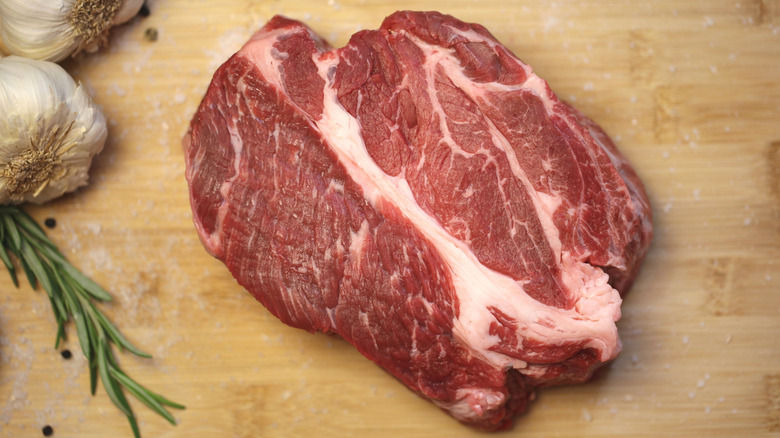 Angus chuck on board with aromatics