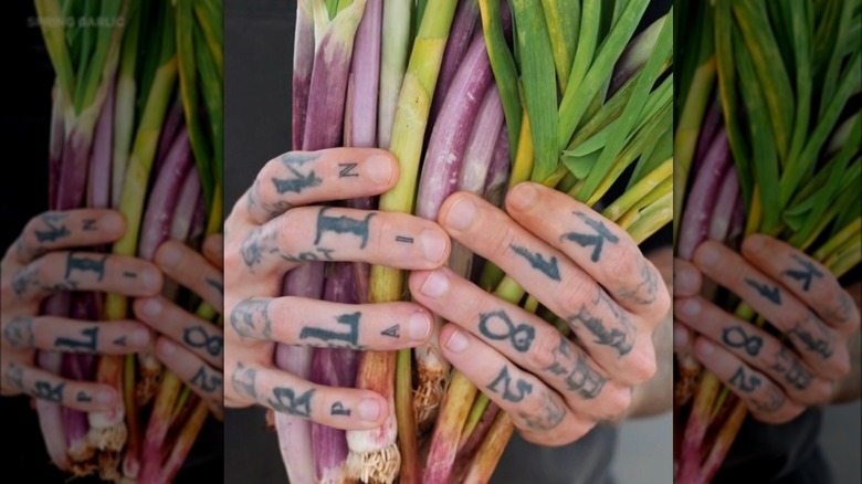 Bunches of colorful green garlic
