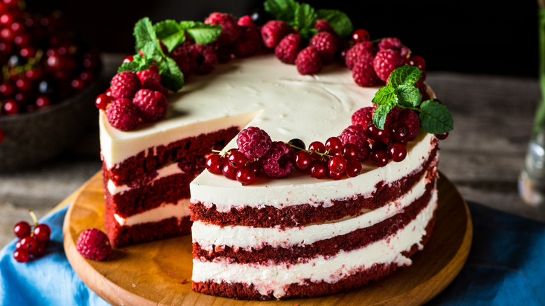Red velvet cake with slice missing