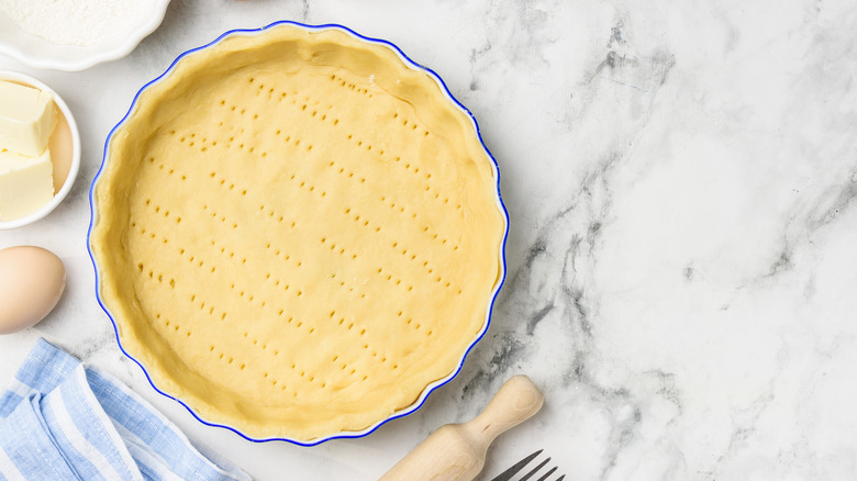 Pie dough in a ceramic pie dish