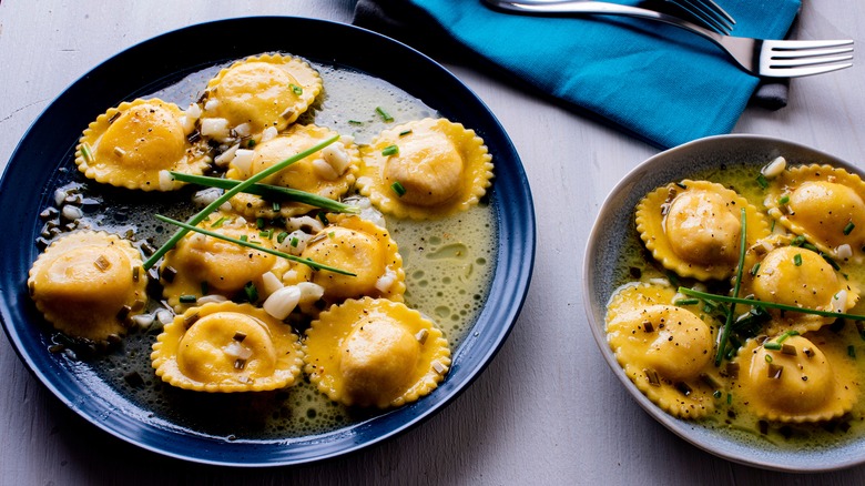 ravioli on plates with garnishes