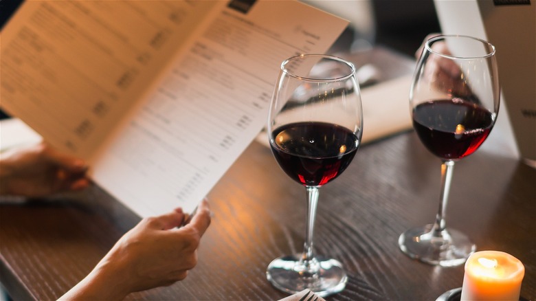 two wine glasses with red wine at a restaurant