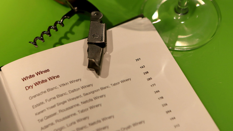 wine menu with cork screw in frame