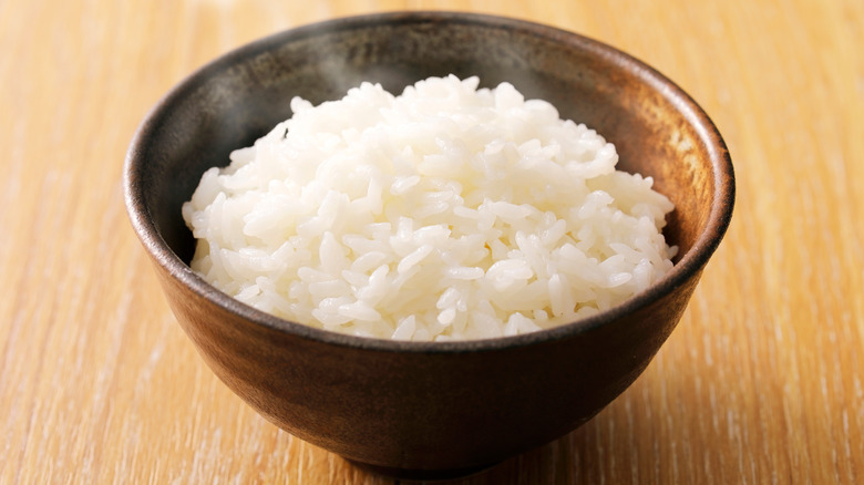 https://www.mashed.com/img/gallery/how-to-stop-your-pot-of-rice-from-bubbling-over/stick-to-low-heat-for-rice-success-1635797405.jpg