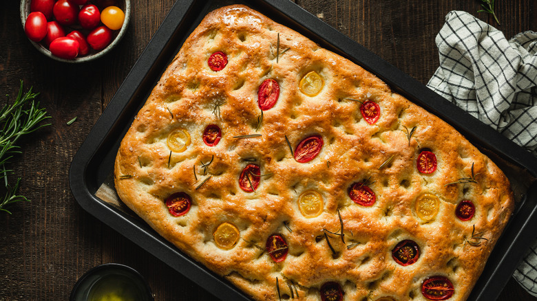 Baked tomato focaccia on pan