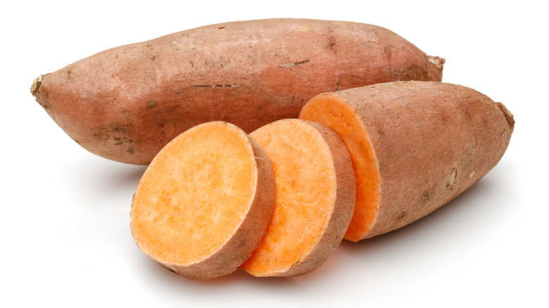 Sweet potatoes on white background