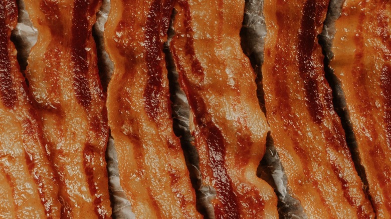 Strips of cooked bacon
