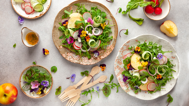 edible flowers garnishing a salad