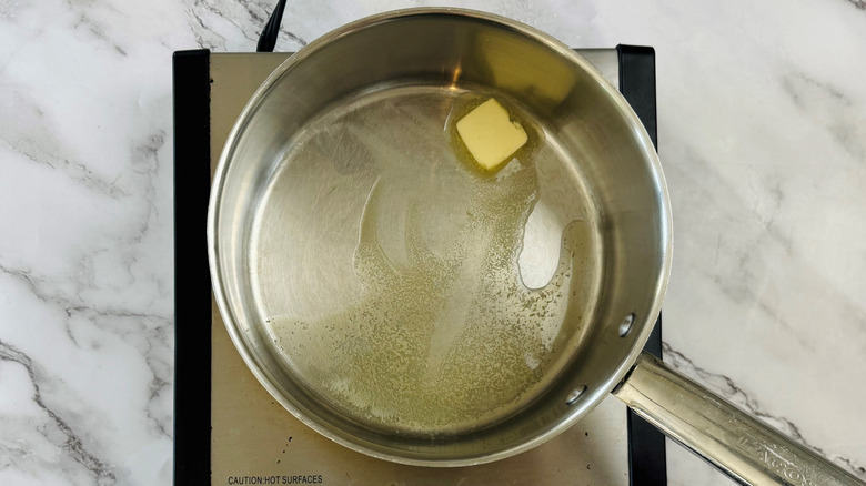 butter in a metal pot