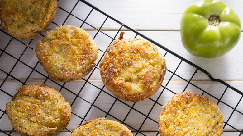 Fried green tomatoes on a rack